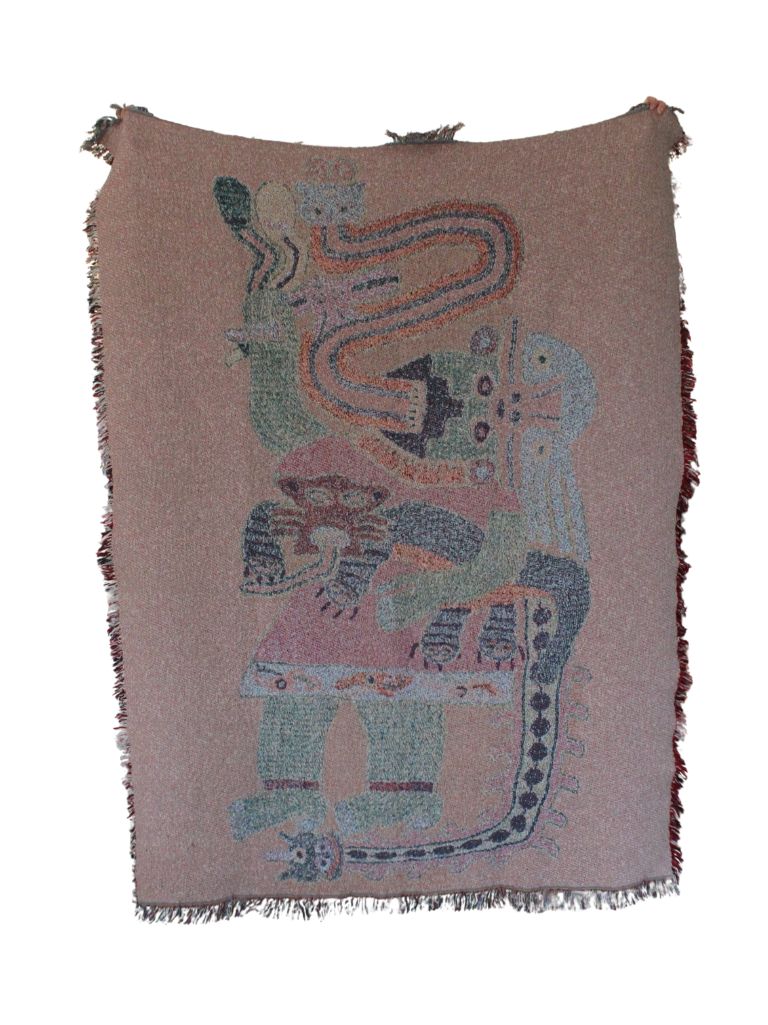 Paracas Mantle of Peru, woven blanket, 100% cotton, eco-friendly, reverse of blanket with cream, blue, red, and green. cultural characters. Shaman, snake animal. Blanket held up on reverse side.
