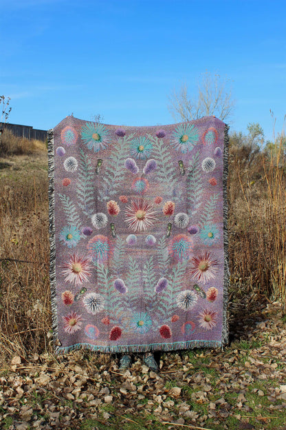 Sonorous Love, Acid Prairie, Floral, boho, and vibrantly crafted, a warm, inviting throw blanket of prairie pollinators in full bloom; purple, mauve, pink, blue and green. 100% cotton, made in USA and eco-friendly