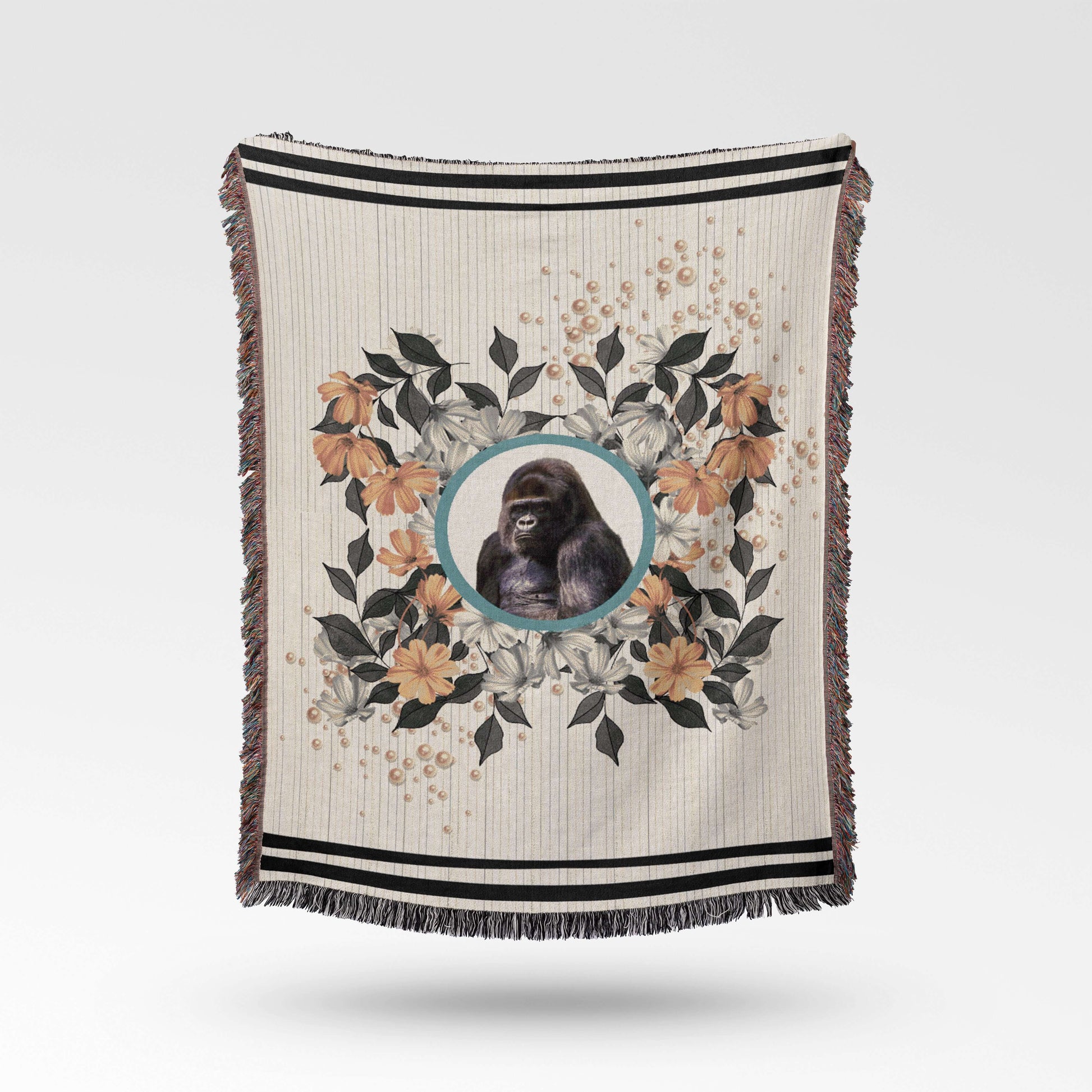 Sonorous Love, Majesty, inspired by the beauty of the endangered Mountain Gorilla, gentle giants of central Africa. Natural, stripe and floral portrait with sherbet orange pearls; eco-friendly woven throw blanket