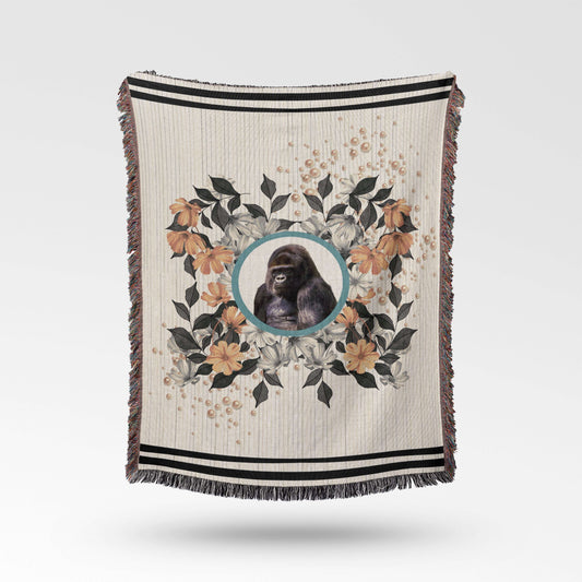 Sonorous Love, Majesty, inspired by the beauty of the endangered Mountain Gorilla, gentle giants of central Africa. Natural, stripe and floral portrait with sherbet orange pearls; eco-friendly woven throw blanket